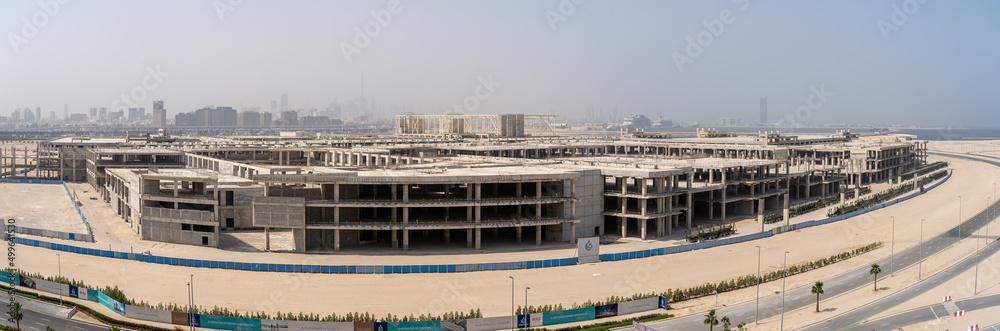 Dubai, United Arab Emirates. New mall or shopping under construction at Dubai. Urban development. Residential and commercial growth