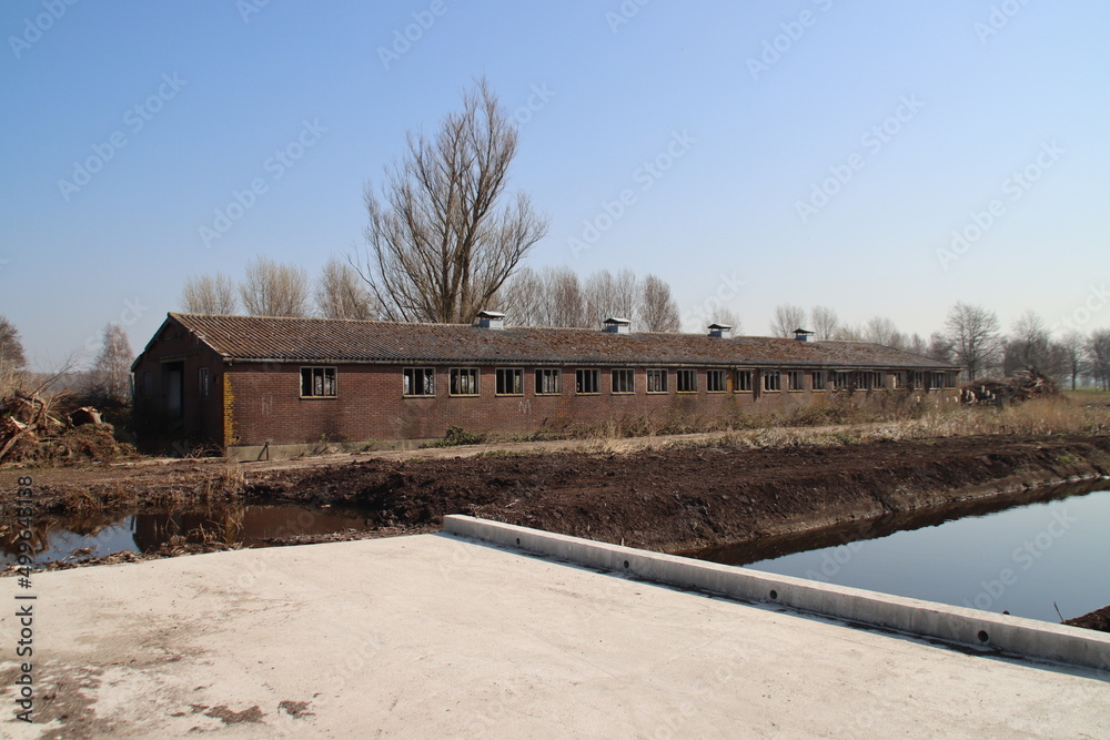 Dilapidated houses with a hole in the roof on the s'-Gravenweg ready to be demolished Dilapidated houses with a hole in the roof on the s'-Gravenweg ready to be demolished