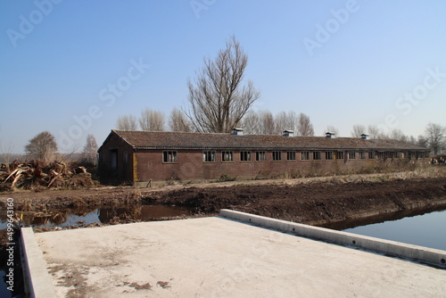 Dilapidated houses with a hole in the roof on the s'-Gravenweg ready to be demolished photo