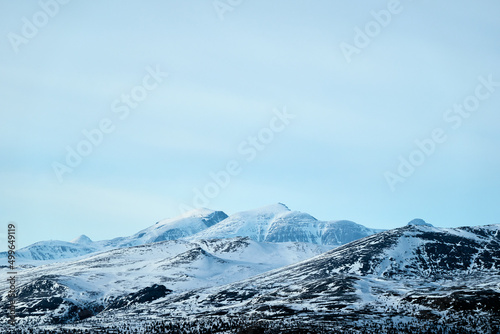 View of the Rondane Mountains of the Rondane National Park, Oppland, Norway, seen from Gålå by Easter.  photo