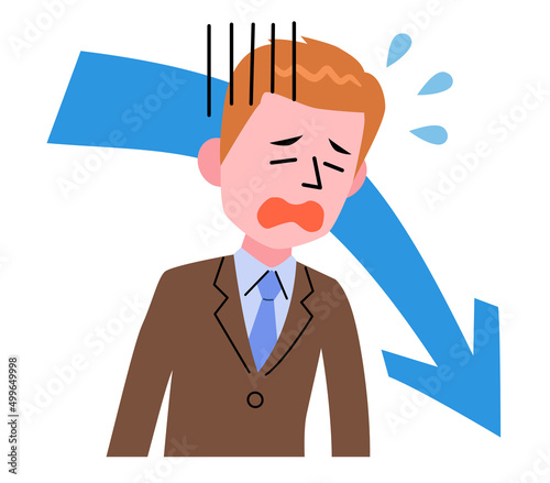 Worried businessman and down arrow