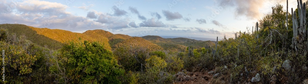Sunrise over Christoffel National Park during the hike up to the top of Christoffel mountain on the Caribbean island Curacao - panorama