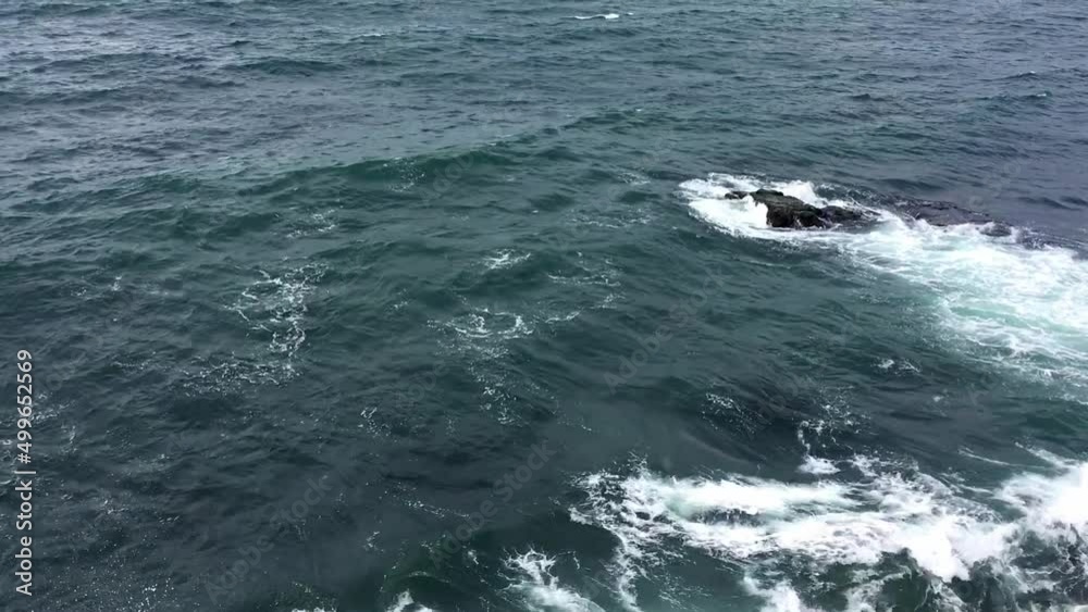 Beautiful blue sea waves crash against the shore. Beautiful blue sea waves crash against the shore.