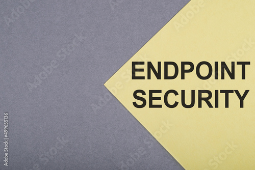 Text ENDPOINT SECURITY on gray and yellow background. Business concept