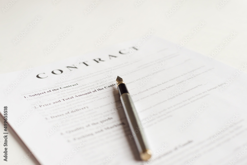 Contract documents on the desk in the office. Contract documents on the desk in the office.