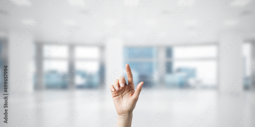 Choosing gesture of person in elegant modern interior in sunshine light Choosing gesture of person in elegant modern interior in sunshine light
