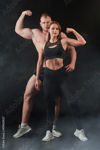 athletic woman and man