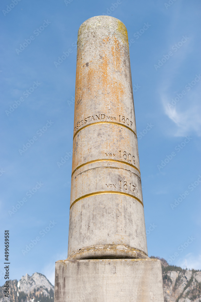 Pillar with water markings in a park in Weesen in Switzerland