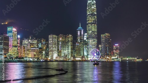Wallpaper Mural Hong Kong, China skyline panorama with skyscrapers at night from across Victoria Harbor timelapse. Torontodigital.ca