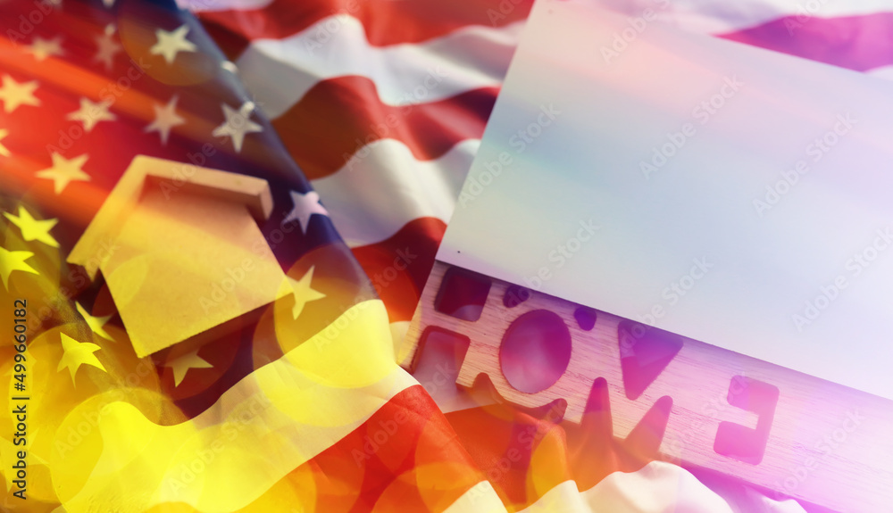 Abstract background. House symbol on the American flag. Real estate insurance. Housing security. Abstract background. House symbol on the American flag. Real estate insurance. Housing security.