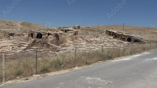Dara, Mardin, Turkey - 16th of June 2021: 4K Excavations of the ancient Dara town behind fence
 photo