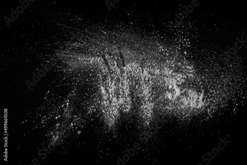 White powder isolated on black texture, top view with clipping path