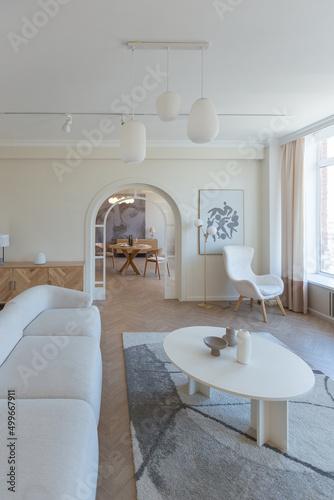 fashionable modern design luxury apartment in light colors. bright day behind huge windows. stylish decoration and no one inside. © 4595886