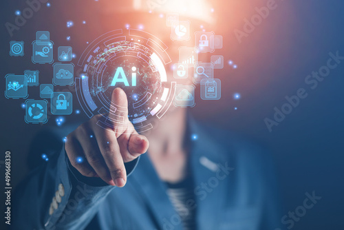 Hand touch on the virtual screen AI business database system processes online marketing investment plans That is connected as a network in the organization Concept of business base system development 