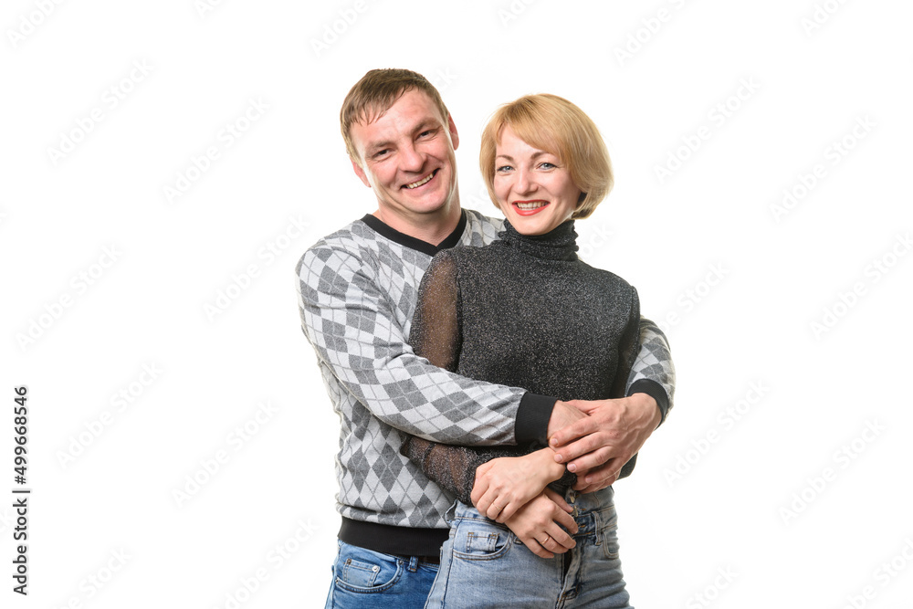 Portrait of smiling couple in casual clothes, isolated on white background Portrait of smiling couple in casual clothes, isolated on white background
