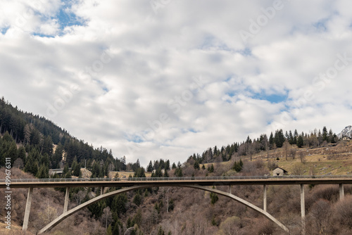 Bridge over a valley at the San Bernardino pass in Switzerland photo
