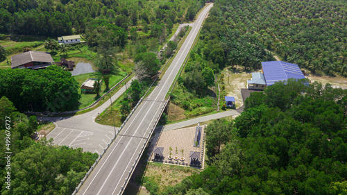 A country road and rural settlement in Sedili Kecil, Johor, Malaysia