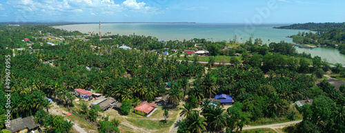 Panoramic aerial drone view of rural settlements near the seaside in Sedili Kecil  Johor  Malaysia