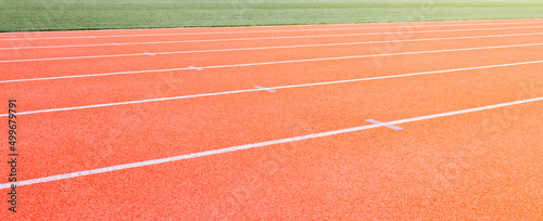 Red running track in stadium. Concept run. Love sport