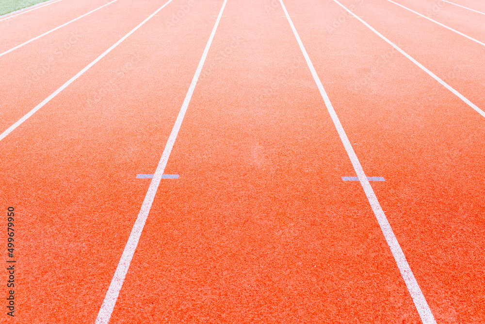 the running track on the stadium. for usage of background, I intentionally defocused