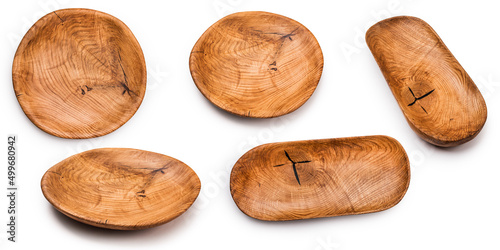 Hand carved bowls on a white isolated background. Oak wood. Irregular shape. A set of bowls.