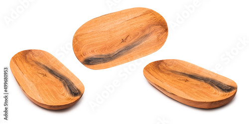 Hand carved bowls on a white isolated background. Oak wood. Irregular shape. A set of bowls.
