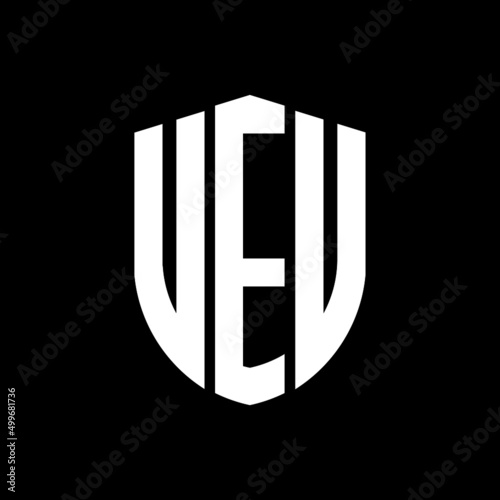 VEU letter logo design. VEU modern letter logo with black background. VEU creative  letter logo. simple and modern letter logo. vector logo modern alphabet font overlap style. Initial letters VEU  photo