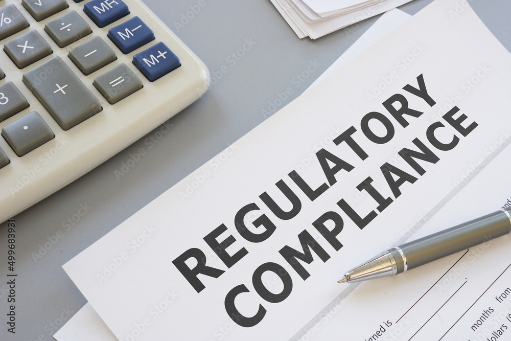 Regulatory compliance is shown using the text