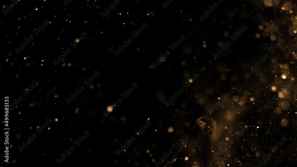 golden waves motion abstract of particles gold dust with stars on black background. wave background gold movement, seamless loop in 4k resolution.