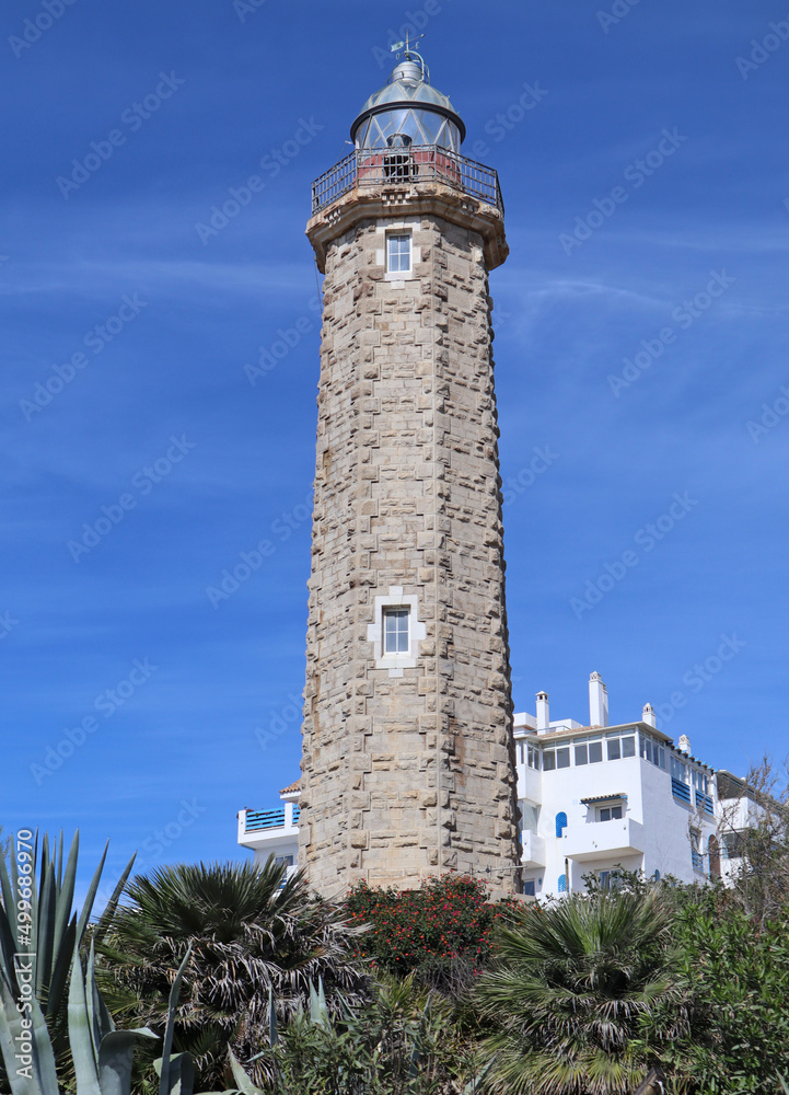 The lighthouse at Estepona in Spain. It stands on the headland known as Punta Doncella at the west end of La Rada beach , close to the marina