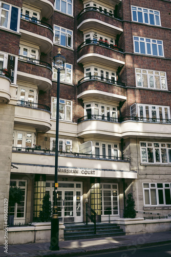 Beautiful residential buildings at the Millbank area on the Thames riverbank photo