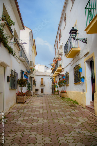 Fototapeta Naklejka Na Ścianę i Meble -  Famous white Architecture of the Marbella city in Spanish Andalusia on the mediterranean sea