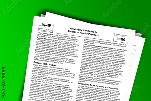 Form W-4P documentation published IRS USA 12.31.2020. American tax document on colored