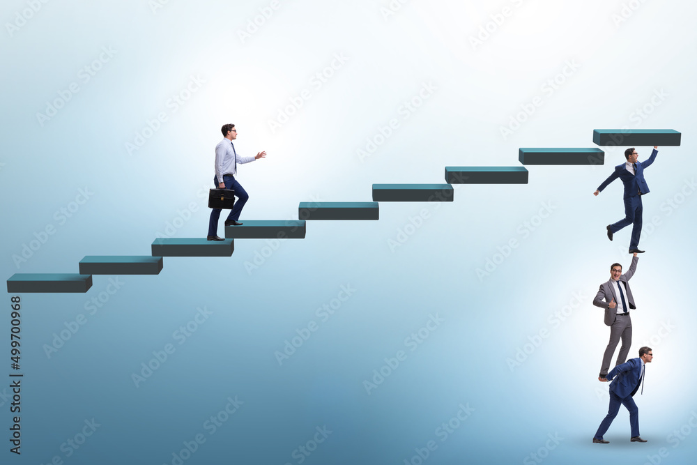 Fototapeta premium Teamwork concept with businessmen helping each other