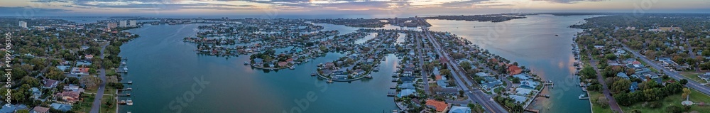 Drone panorama over South Causeway Isles and Treasure Island in St. Petersburg in Florida during sunset