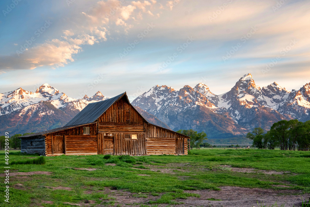 Mormon Row in Jackson Hole, Wyoming on a partially cloudy day