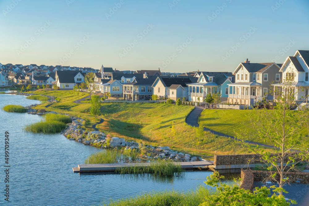 Fototapeta premium Residential houses at Daybreak in South Jordan, Utah with Oquirrh Lake waterfront