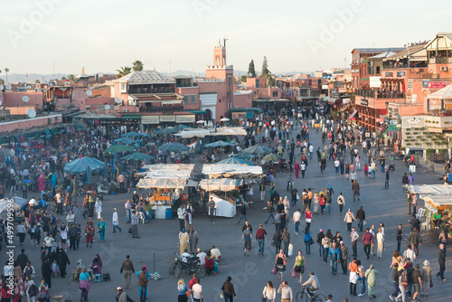 A view of food stalls in the market and public square Jema El Fna Square in Marrakech at dusk. Marrakech, Morocco photo