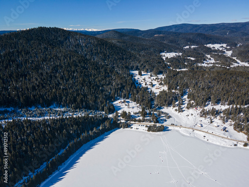 Aerial winter view of Beglika Reservoir covered with ice, Bulgaria