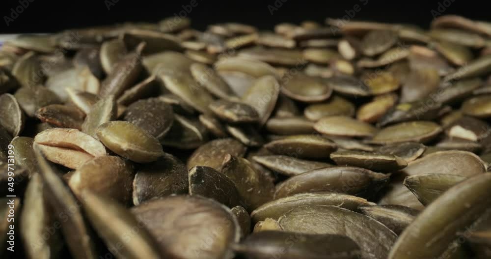 Pumpkin seeds in a pile probe lens macro Pumpkin seeds in a pile probe lens macro