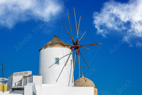Traditional Greek windmill against the blue sky.