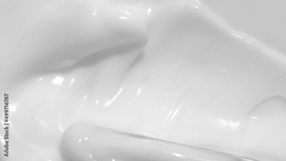Creamy skincare lotion mousse product closeup footage. White cream ...