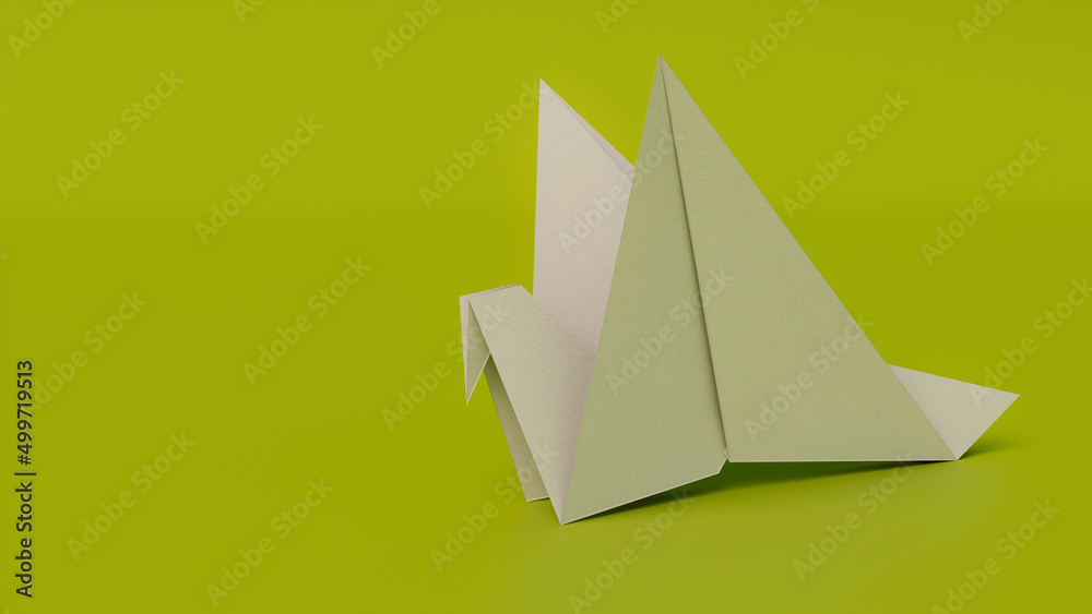 Bird made from folded White paper against Green background. Origami concept with Copy Space. Bird made from folded White paper against Green background. Origami concept with Copy Space.