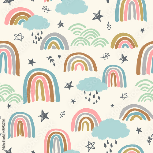 Seamless vector repeat pattern in boho earthy colors with shooting stars, rainbows, clouds, flowers. gender neutral bohemian background