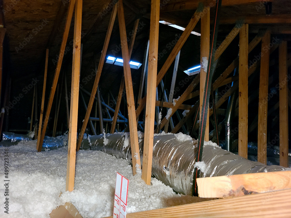 Attic / Crawlspace Under Roof With Insulation Foam and Rafters Taken During  Florida Home Inspection Stock Photo