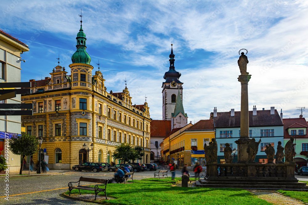 Fototapeta premium Typical narrow streets of czech city of Pisek in sunny autumn day. Czech Republic
