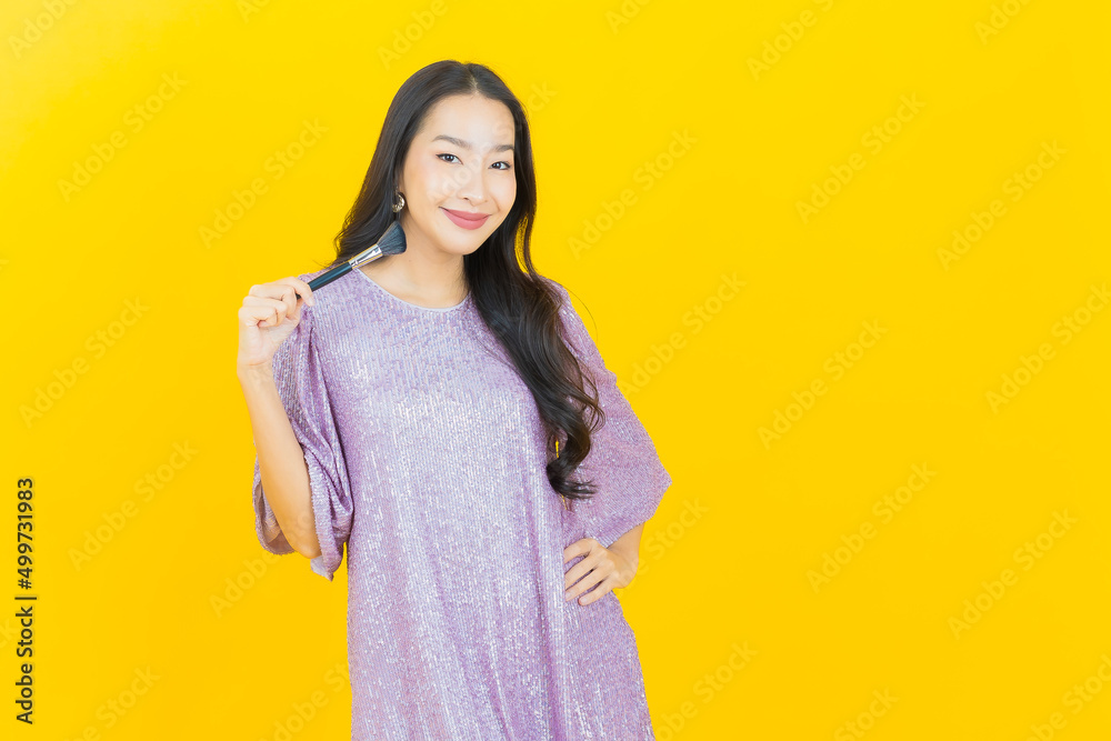 Portrait beautiful young asian woman with make up brush cosmetic Portrait beautiful young asian woman with make up brush cosmetic