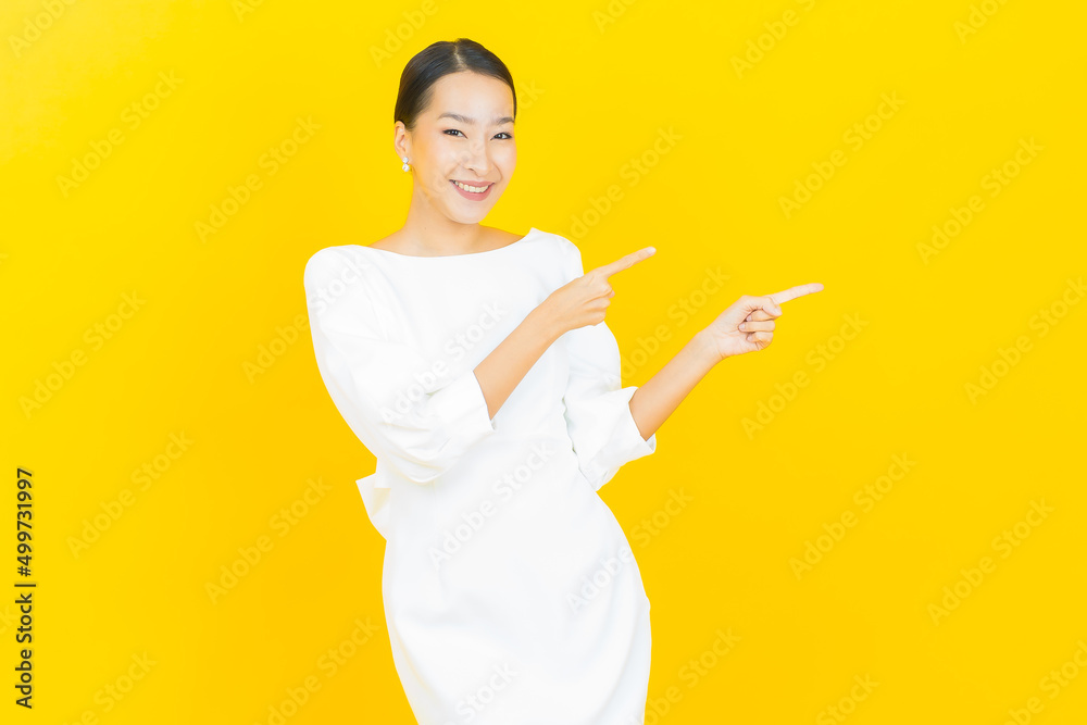Portrait beautiful young asian woman smile with action Portrait beautiful young asian woman smile with action