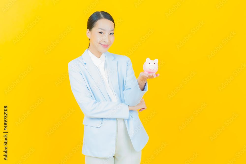 Portrait beautiful young asian woman with piggy bank Portrait beautiful young asian woman with piggy bank