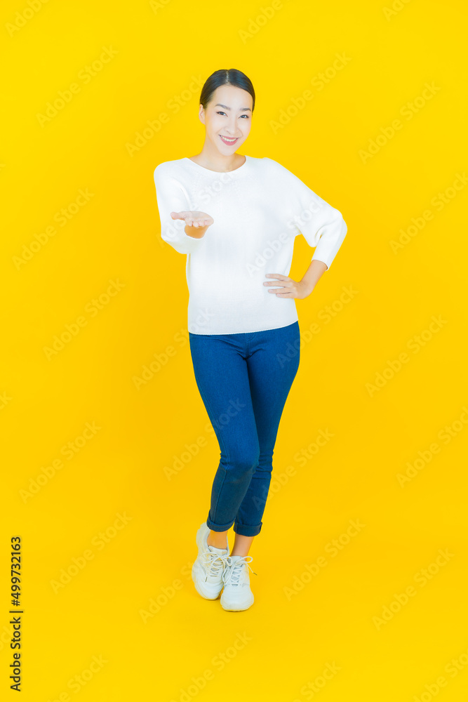 Portrait beautiful young asian woman smile with action Portrait beautiful young asian woman smile with action